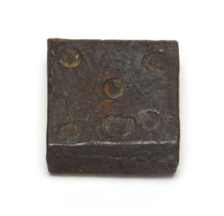 Square-shaped metal weight for scale
