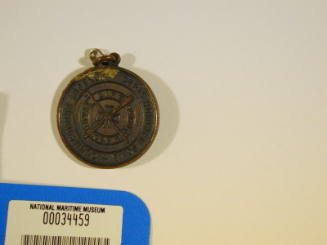 Royal Life Saving Society bronze medal awarded to G.J. Mayes 3 April 1941