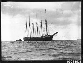 The six-masted schooner HELEN B STERLING under tow