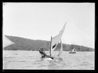 6-foot skiff vessel sailing near shoreline, Sydney Harbour