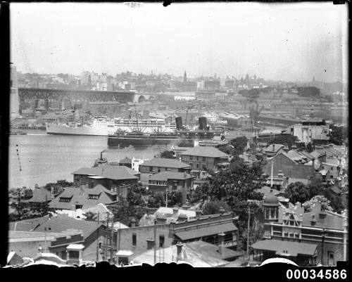 Two passenger liners passing each other on Sydney Harbour viewed from McMahons Point