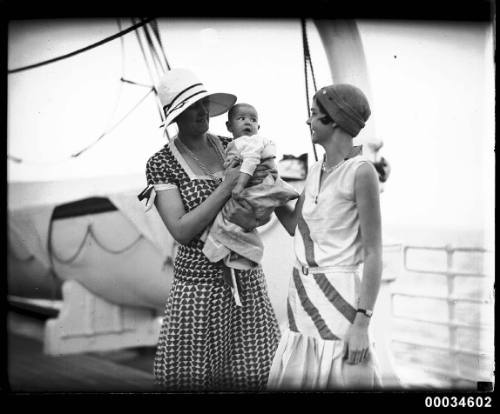 Portrait of two women and a baby possibly on board SS ORMISTON