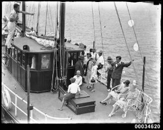 Group of people on the deck of a sailing vessel