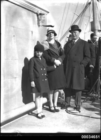 Three people at a Movietone event on board SS SIERRA