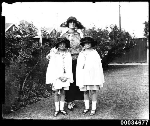 Portrait of a woman with two young girls