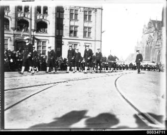 US Navy officers and sailors marching through Sydney