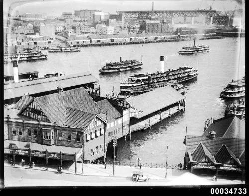 Circular Quay with view of Sydney Harbour Bridge under construction