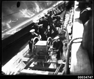 Crew of the Chilean naval vessel GENERAL BAQUEDANO preparing for a dive