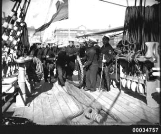 Chilean sailors with ropes on deck of GENERAL BAQUEDANO
