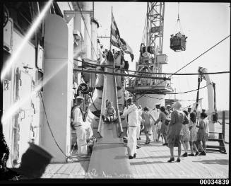 Children on a slippery slide on board HMAS AUSTRALIA II