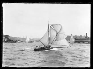 Unidentified 18-footer finishing a race at Clark Island, inscribed 442