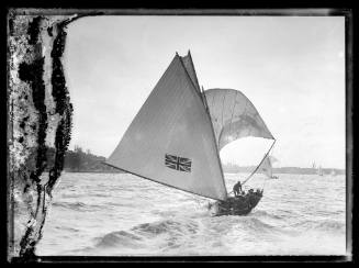 Two champion 18-foot skiffs on Sydney Harbour, inscribed 498