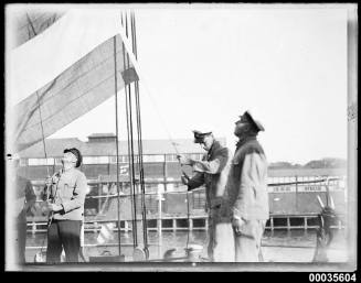 Hoisting the German Imperial flag on MAGDALENE VINNEN