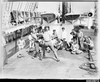 Crew of the four-masted steel barque MAGDALENE VINNEN in a boxing match