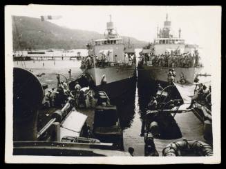 Alongside Ambon for embarkation of Japanese prisoners of war.  HMAS GLENELG (foreground)