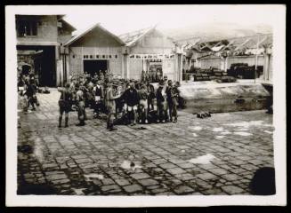 Survivors "Gull" force AIF - waiting on wharf Amboina - September 1945. 139 survivors out of approximately 500