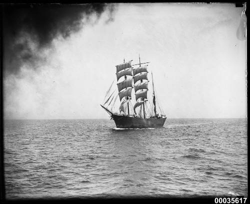 Sailing barque at sea port bow view