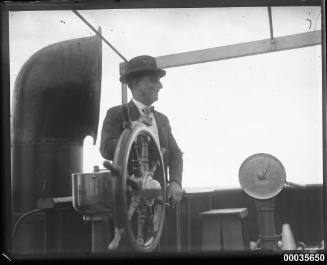 Man possibly at the wheel of the German barque GUSTAV