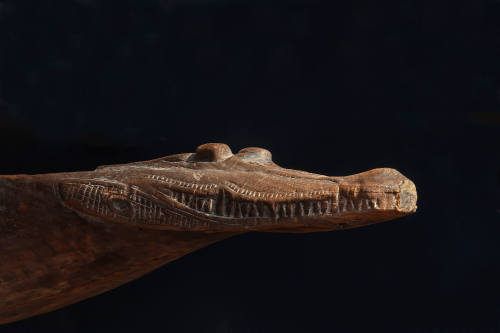 Sepik River dugout canoe of the Iatmul people with crocodile head prow