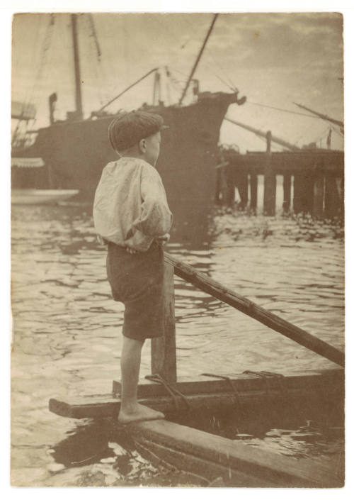Sydney Harbour scenes : boy on a raft