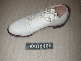 Right leather lace up shoe that forms part of WRANS summer uniform used by Margaret White (matching shoe 00036399)