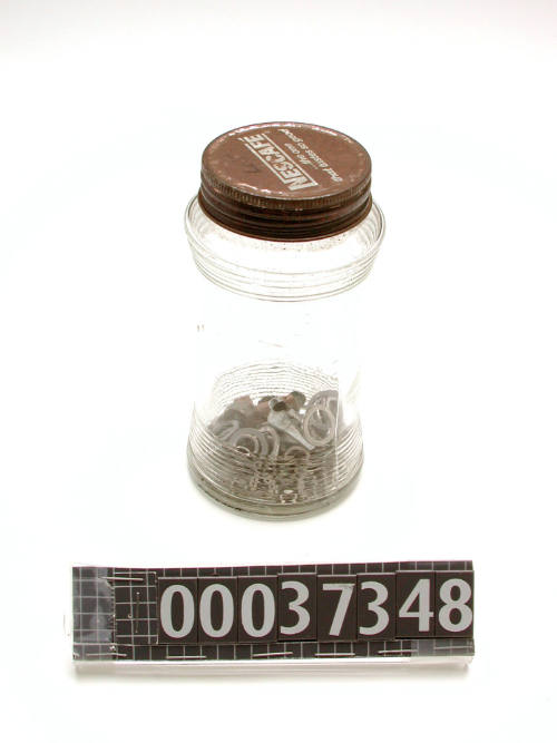 Jar of washers and plot light used by Norman Stirton during his employment at the Maritime Services Board of New South Wales