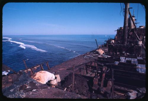 The top section of a shipwreck located in shallows waters of the Coral Sea