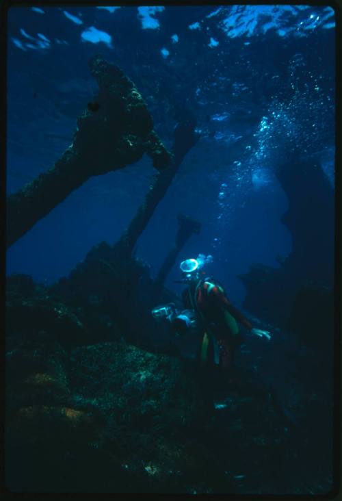 Diver underwater at wreck of COOMA