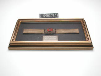 UNIFORM CAP BADGE FOR HOWARD SMITH LINE, WORN BY CAPTAIN JOHN PATERSON ON SS "PERIOD" FROM THE 14th JANUARY 1909 TO THE 2nd JUNE 1910, FRAMED WITH BRASS PLAQUE EXPLAINING PROVENANCE OF BADGE