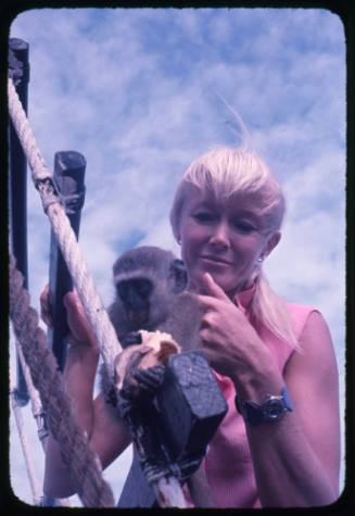 Valerie Taylor and a Vervet Monkey onboard the Terrier VIII vessel