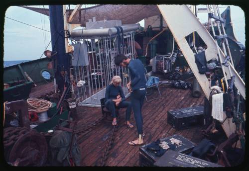 Valerie Taylor and Stuart Cody on board the Terrier VIII preparing for a dive during the filming of Blue Water, White Death