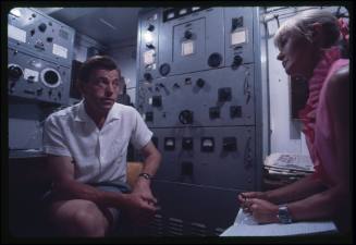 Valerie Taylor and one of the crew from the documentary Blue Water, White Death in the control room of the Terrier VIII
