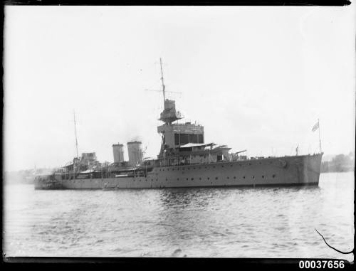 HMS DRAGON anchored on the northern side of Sydney Harbour