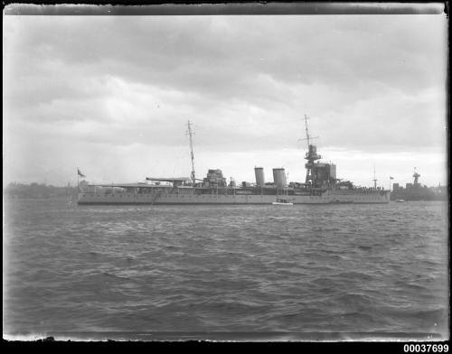 HMS DUNEDIN off the eastern side of Garden Island