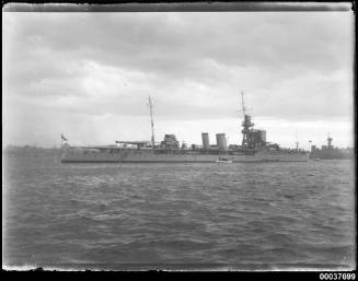 HMS DUNEDIN off the eastern side of Garden Island