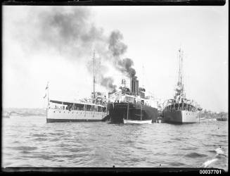 HMS DRAGON, BRITISH BEACON and HMS DUNEDIN anchored off Garden Island