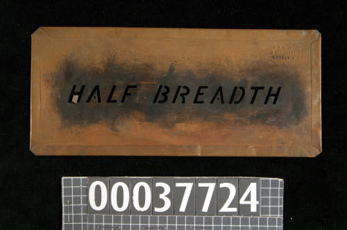 Stencil featuring the words HALF BREADTH