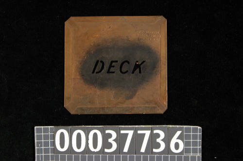 Stencil featuring the word DECK