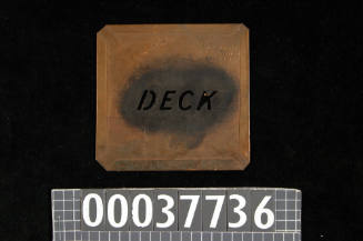 Stencil featuring the word DECK