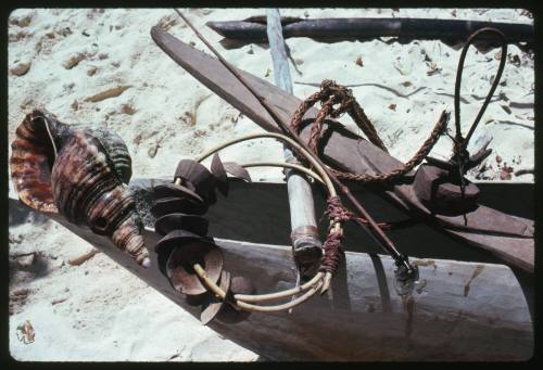 Shark calling equipment on outrigger canoe