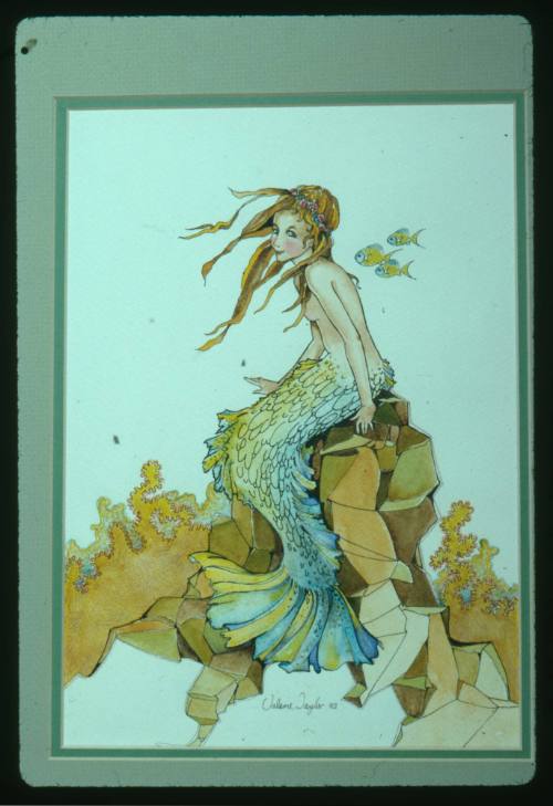 Mounted artwork of a mermaid seated on a rock