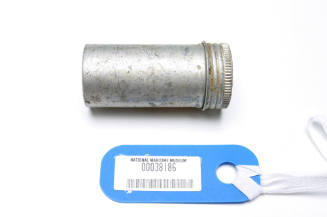 SKF metal film cannister used as a container for fishing hooks