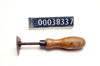 SHAVE HOOK WITH ROUNDED WOODEN HANDLE HOLDING A METAL RING