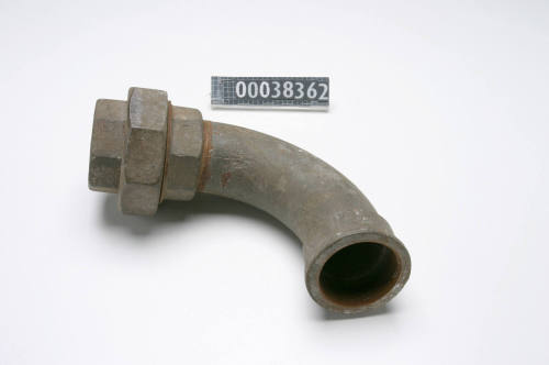 Metal pipe elbow used by ship plumber John Carrol