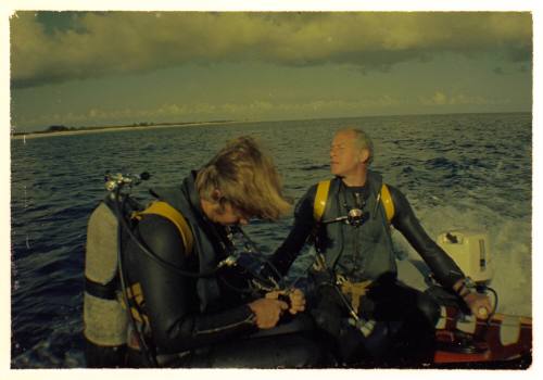 Peter Gimbel and Peter Lake on a motorboat