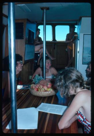 Six people in the cabin of a vessel