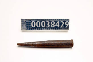 Punch in the shape of thick nail used by ship plumber John Carrol