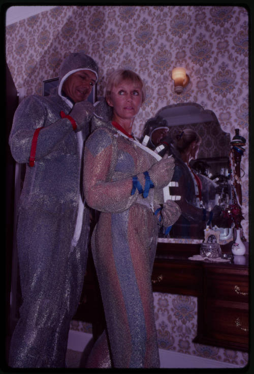 Behind the scenes image from the television feature, Operation Shark Bite, that documented Ron and Valerie Taylor testing the efficacy of the chainmail suit (mesh suit) against shark bites.  