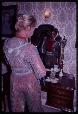 Behind the scenes image from the television feature, Operation Shark Bite, that documented Ron and Valerie Taylor testing the efficacy of the chainmail suit (mesh suit) against shark bites.  