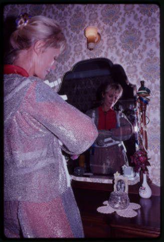 Behind the scenes image from the television feature, Operation Shark Bite, that documented Ron and Valerie Taylor testing the efficacy of the chainmail suit (mesh suit) against shark bites.  